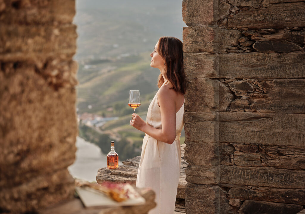Royal Oporto 10 Year Old White woman enjoying a glass